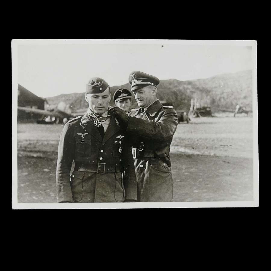 Photo - Luftwaffe officer being presented with Iron Cross
