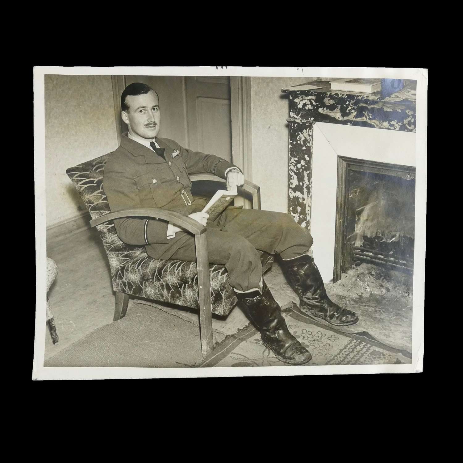 Air Ministry photo - pilot enjoying his rest post sortie, 1940